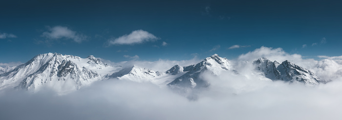 Majestic snowcapped mountains in France (Val Thorens). Panoramic view from Cime Caron (3200m).