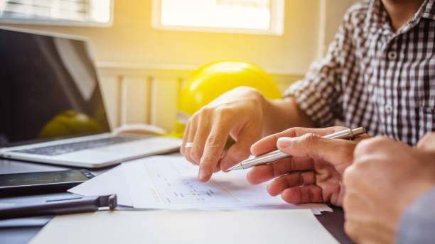 istock Two young engineers are working on consultations. 1269232694