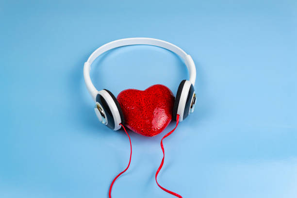 istock red heart in headphones 1269238760