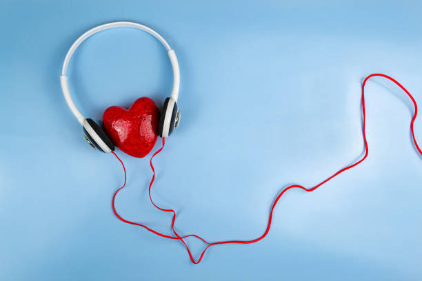 istock red heart in headphones 1269238763