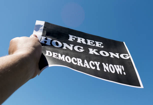 istock Free Hong Kong. Democracy Now- message on banner 1269238797