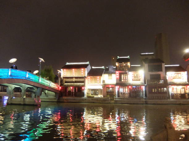 istock Night view of Qingming Bridge old canal block 1269243224
