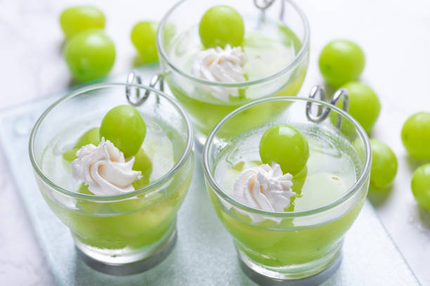 Fruit jelly served with grapes