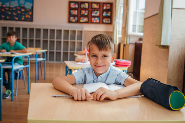 istock Portrait of smiling schoolboy 1269250248