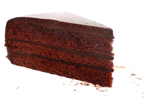 istock Brown chocolate cake slice on white background. 1269251425