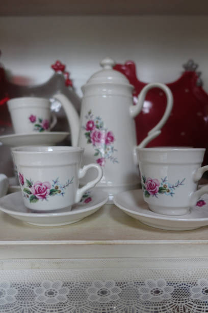 istock Ceramic coffee cups and coffee maker on a buffet shelf 1269258124