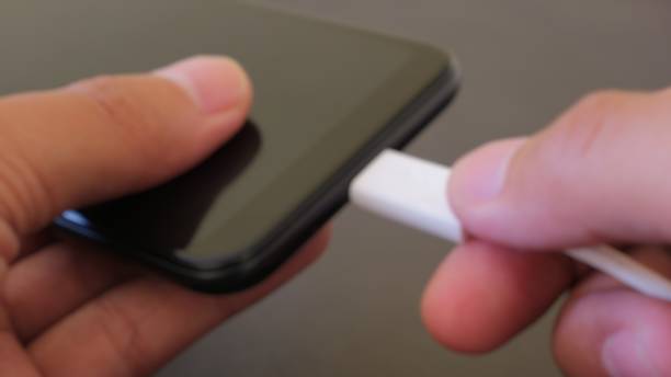istock blurry photo charging a cellphone in West Java, Indonesia, August 28, 2020 1269258561