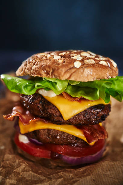 istock Double Cheese Burger with Tomatoes, Onions and Salad 1269259912