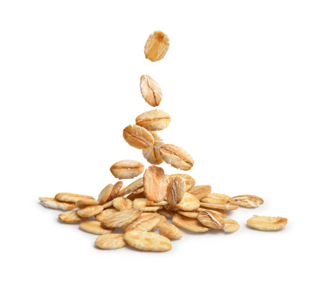 istock oatmeal falling on a pile on a white background 1269261397