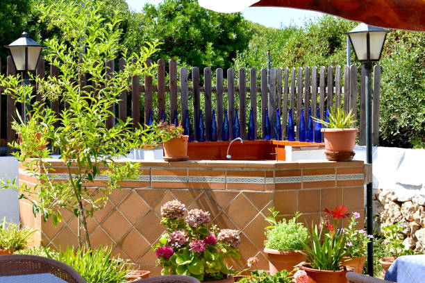 istock attractive Mediterranean outside bar with blue colored bottles in background 1269272882