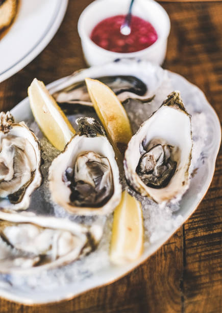 istock Fresh Irish oysters with lemon and red onion sauce 1269278500