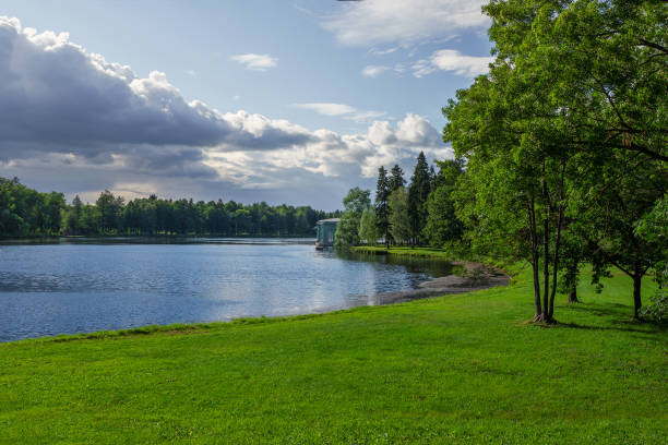 istock Pond with a green lawn on a bright sunny day 1269282587