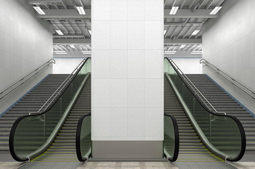 Blank wall mock up underground with escalator and stairs. 3d render.