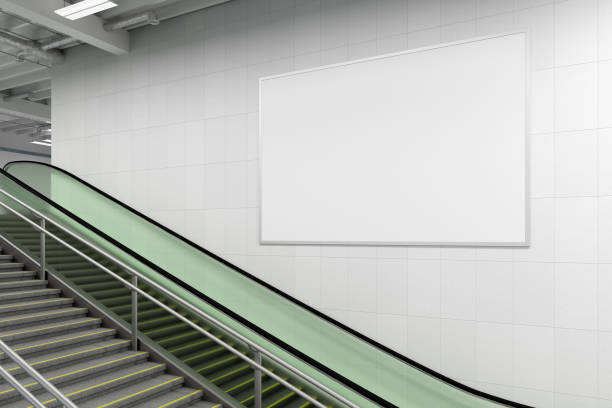 istock Horizontal poster mock up on the wall with escalator and stairs. 1269283922