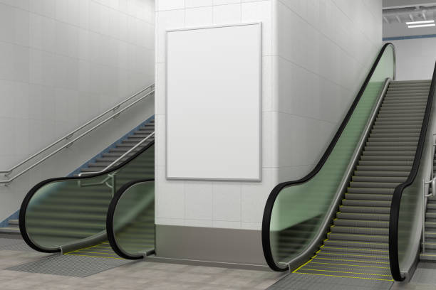 istock Poster mock up on the wall with escalator and stairs. 1269284009