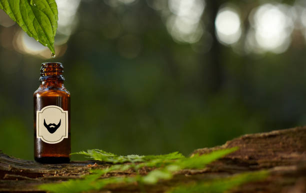 istock Essential oil for beard or aromatherapy in glass bottl. Copy space on bottle 1269286224