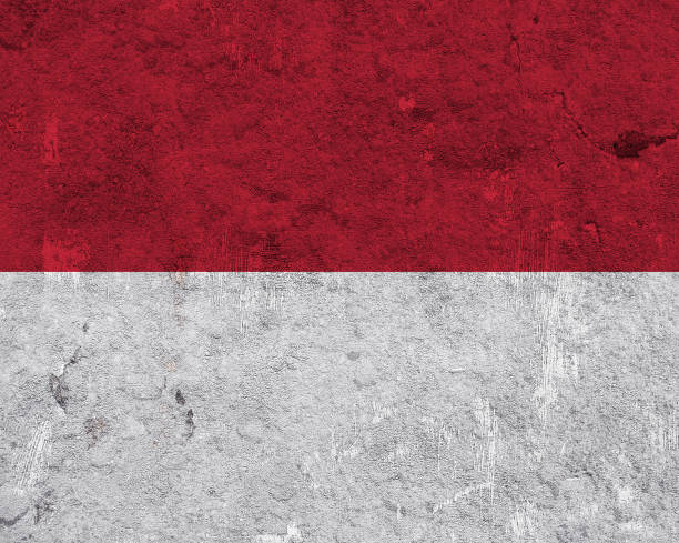 istock Flag of Indonesia on weathered concrete 1269288532