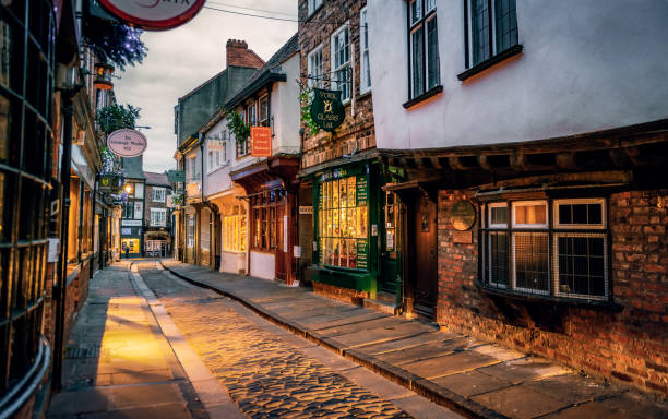Historic York: The Shambles The Shambles, a medieval street preserved in the heart of the English city of York, still busy with boutique shops and cafes. yorkshire england photos stock pictures, royalty-free photos & images