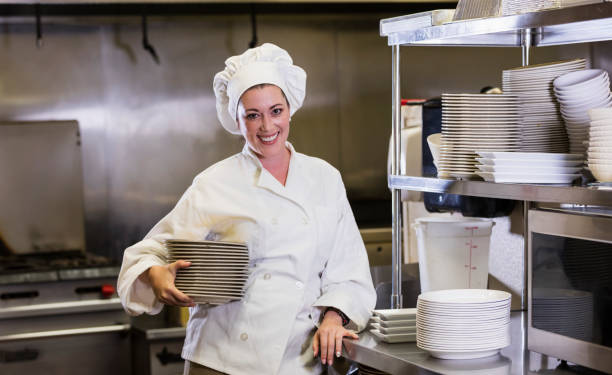 istock Hispanic female chef in restaurant kitchen 1269293202