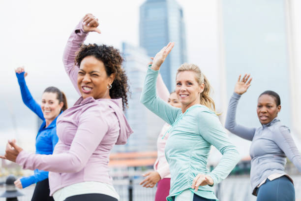 istock Multi-ethnic group of women taking dance exercise class 1269295774