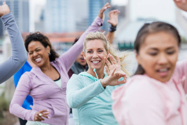 istock Group of adults in dance exercise class 1269295776