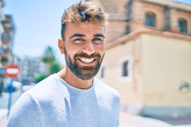 istock Young hispanic man smiling happy walking at the city 1269296482