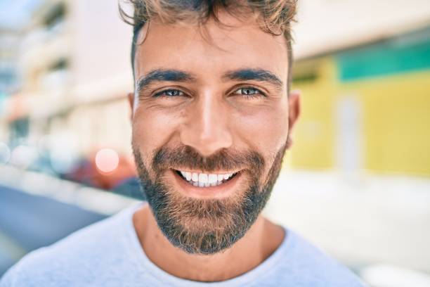 istock Young hispanic man smiling happy walking at the city 1269296523