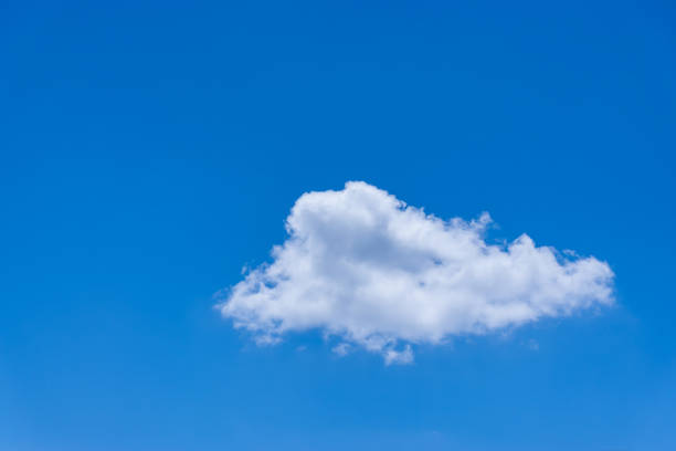 istock one white cloud isolated front of the blue sky 1269297185