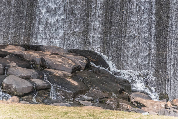 Water flowing over the spillway at Lake Canobolas in Orange, NSW, Australia