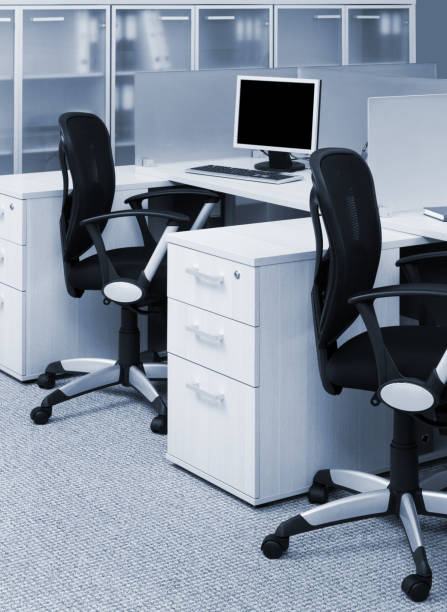istock desks and chairs in a modern office 1269306418