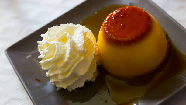 istock Caramel flan with whipped cream 1269315689