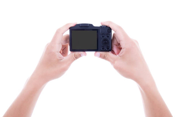 istock male hands holding digital camera with blank screen isolated on white 1269320883