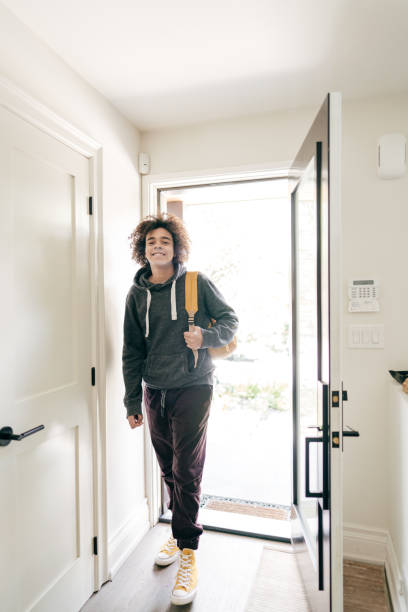istock Smiling teenager with backpack ready for school 1269322965