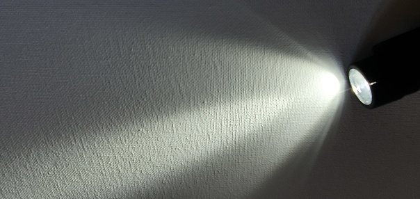 Light shining on white background