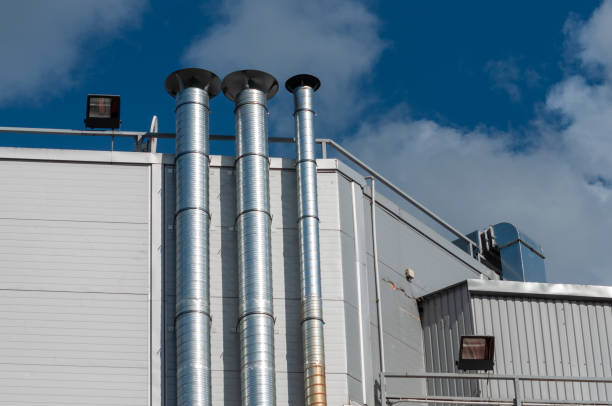 istock silver metal hoods on a building wall. 1269330697