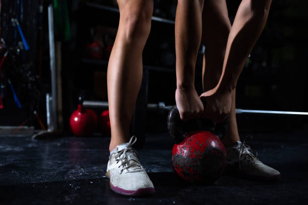 istock A female cross training athlete lifting a kettlebell 1269330761