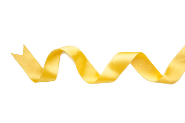 istock Shiny gold satin ribbon on white background with copy space 1269332527