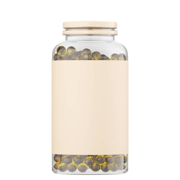 istock Transparent jar with round yellow capsules and a beige blank label. 3D rendering 1269333396
