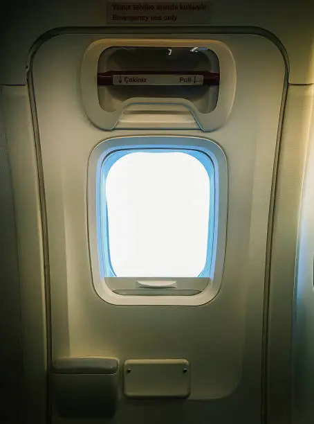 airplane window in flight. view of a small airplane window.