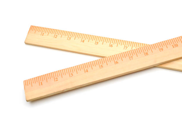 istock two inch wooden rulers on white 1269334989