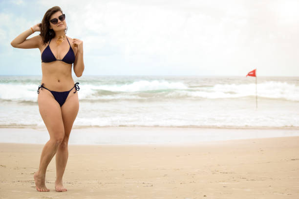 young woman in bikini on the beach