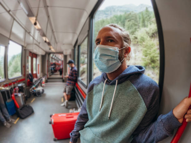 istock Man using public transportation during Coronavirus pandemic 1269340760