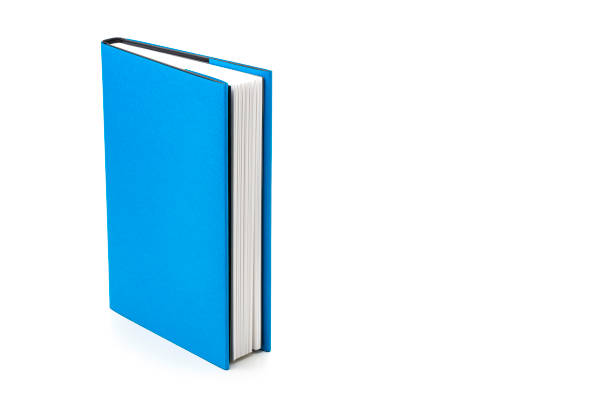 istock Blue book isolated on white background. Copy space 1269341600