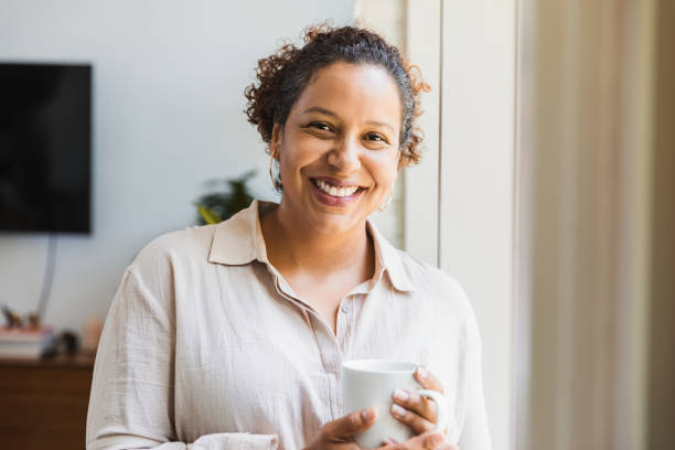 istock Stay at home mom relaxes with cup of coffee 1269341655
