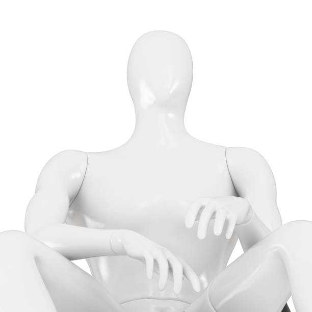 istock White male mannequin made of plastic in a sedentary pose on a white background. 3d rendering. 1269342473