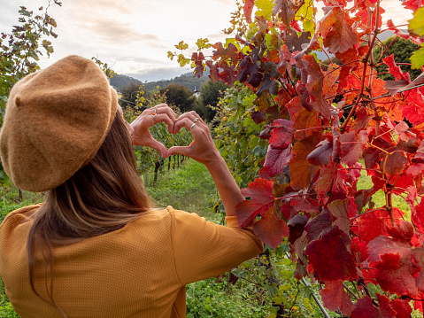 Woman loving the vineyard