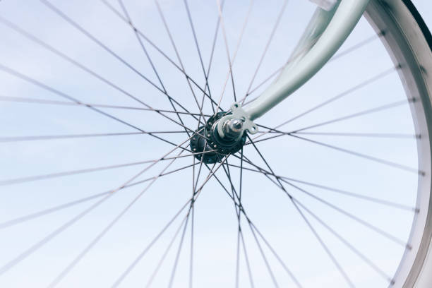 istock Close-up of a bicycle wheel on a blue sky 1269353582