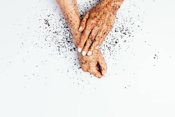 istock Female hands in coffee scrub 1269353631