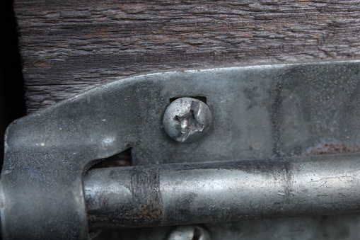 Wooden beam and bolts
