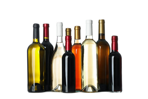 istock Bottles of wine isolated on white background 1269366929